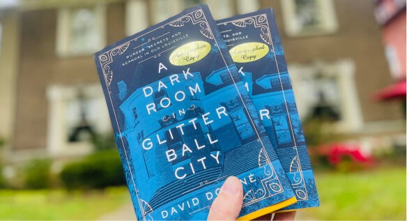 Signed copy of A Dark Room in Glitter Ball City by David Dominé