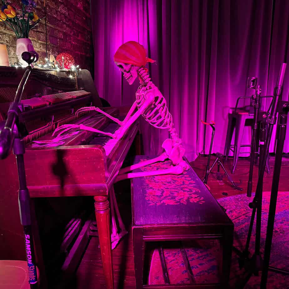 Skeleton playing piano at The Misfit Lou, start of the downtown Louisville walking tour